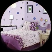 Purple, Purple & Gray Polka Dots Wall Stickers - Create all kinds of fun designs with these polka dots. 
Go for a fun, quirky look with the Lots O' Dots Comforter Set from Young Attitudes by Kathy Ireland. This playful ensemble features scattered purple polka dots over an ivory background, with blocks of purple at the base of the cover as well as a solid purple bedskirt. With thick cording on all sides to enhance wearability, this bedding set is made for comfort and quality to last for years to come. 